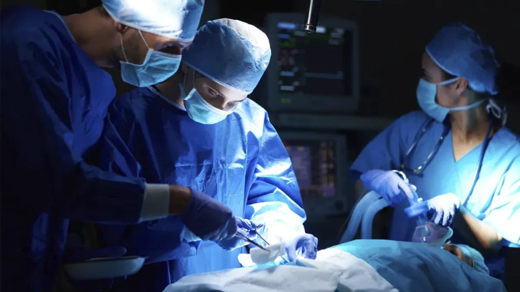 Performing the procedure as a laparotomy in the operating room