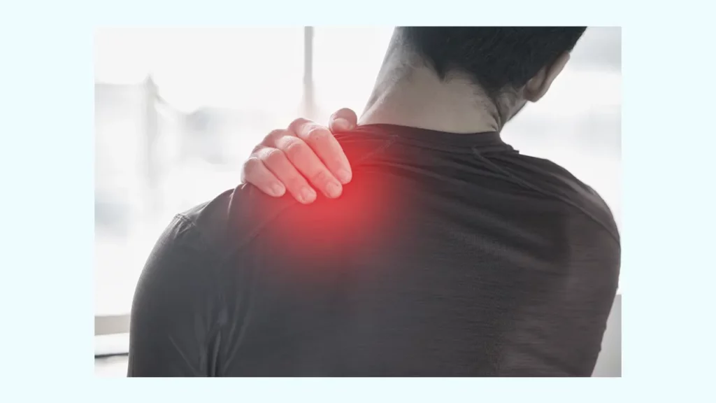 A man feeling pain in his shoulder.