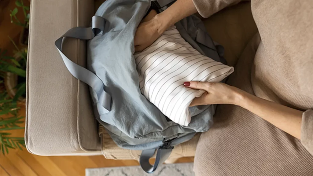 A woman preparing her things.