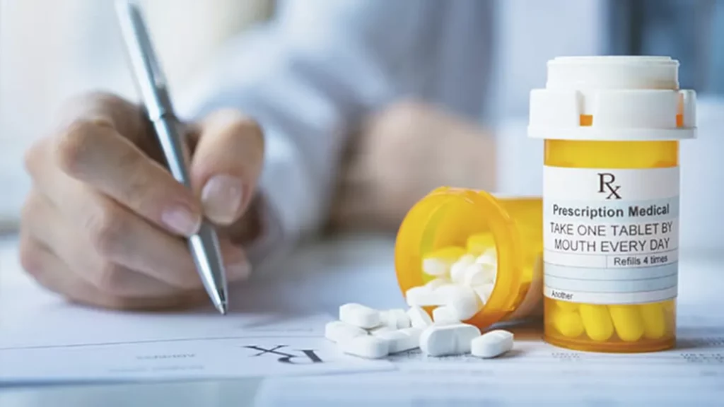 A doctor who is prescribing medication