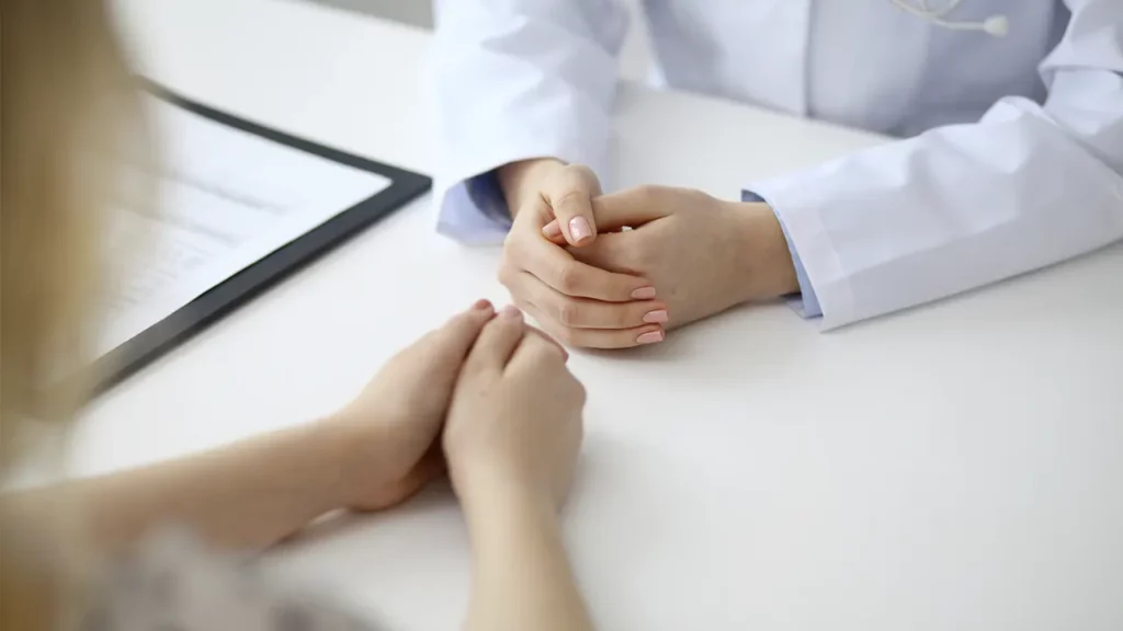 The patient and the doctor are talking.